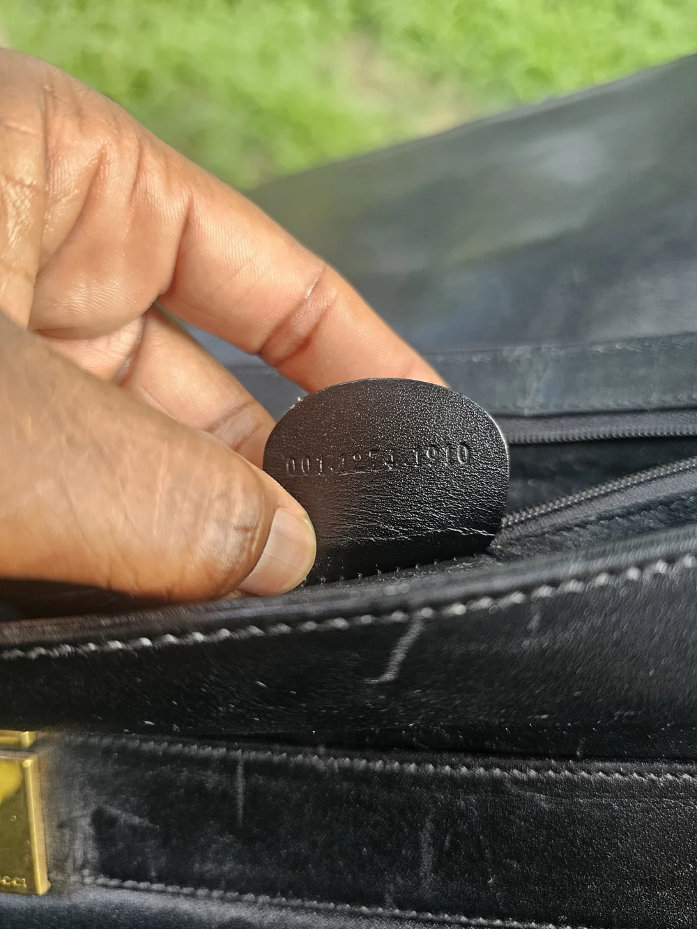 Black Leather Shoulder Bag with Gold Accent
